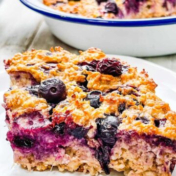 A slice of baked oatmeal with blueberries.