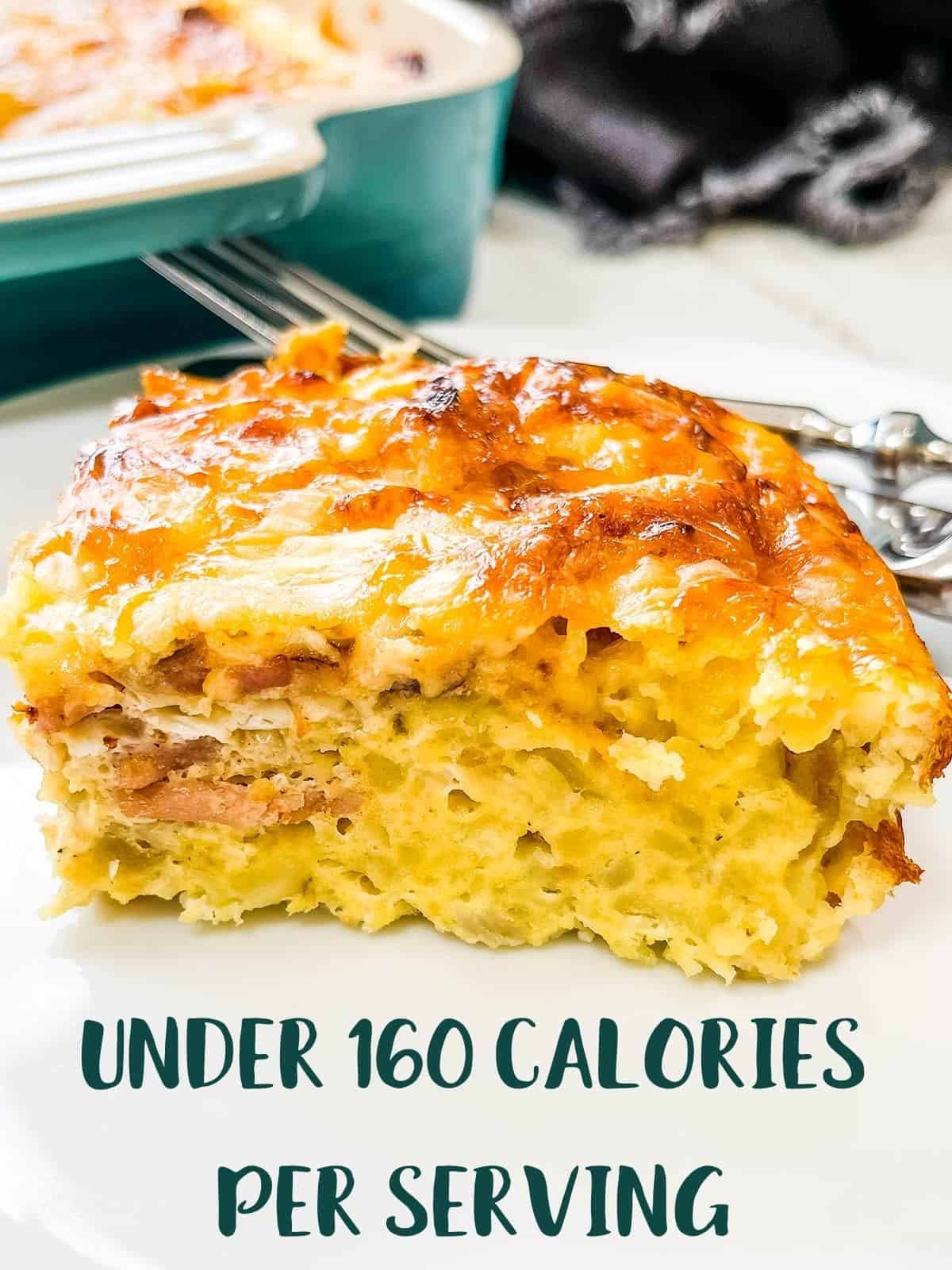 A close up picture of a slice of breakfast casserole with text overlay stating 'under 160 calories per serving'.