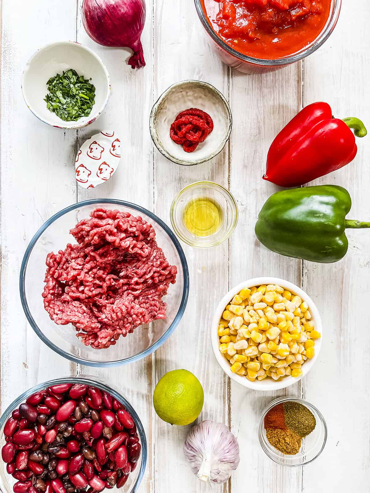 Ingredients used to make taco soup laid out on a table.