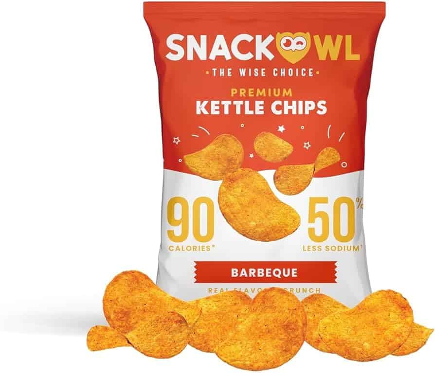 A packet of Snack Owl Kettle chips with some chips infront. Set on a white background.